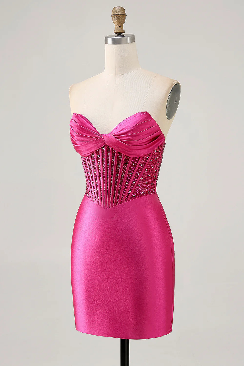 Back view of fuchsia strapless bodycon dress.