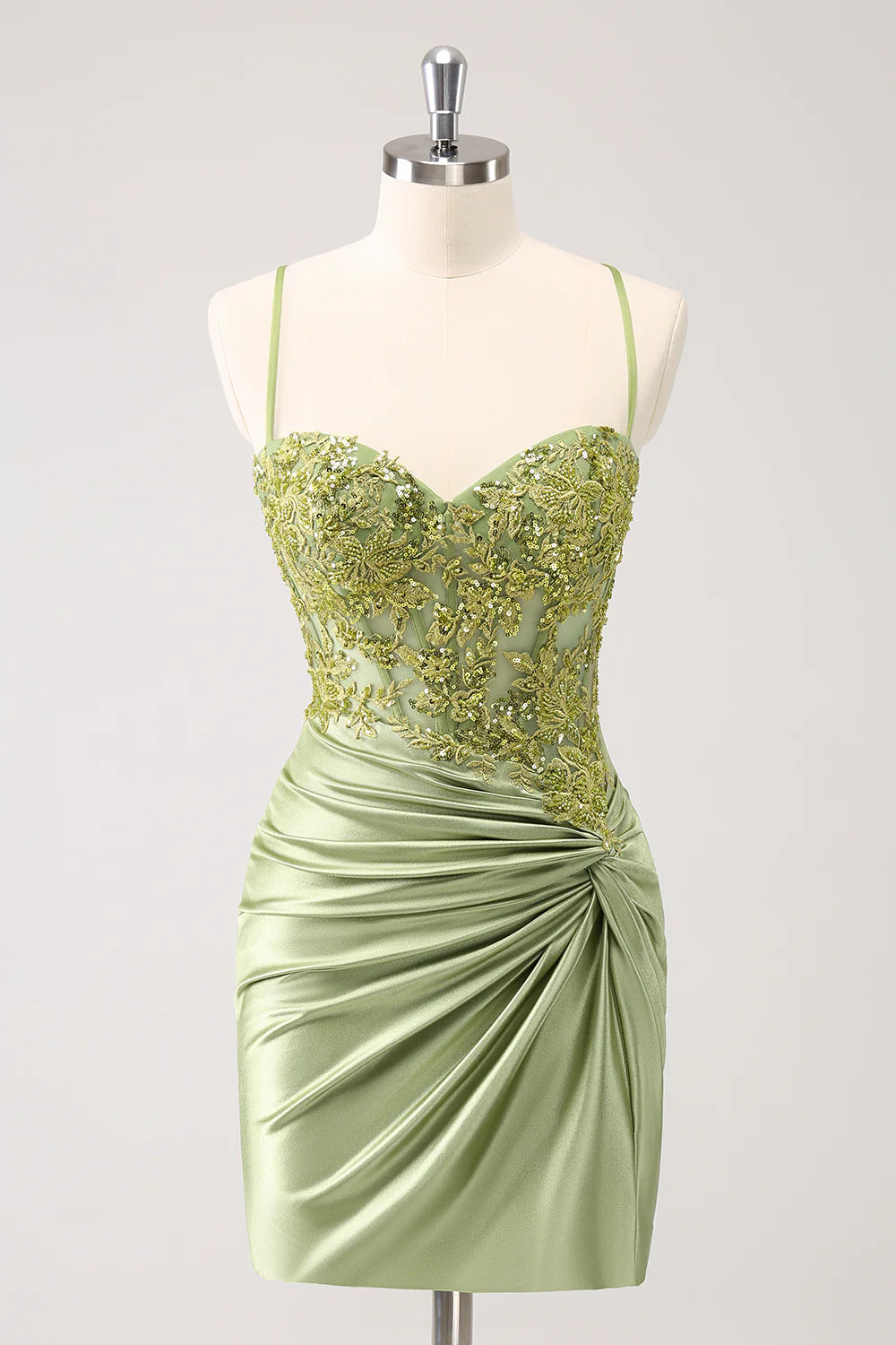 Army green bodycon homecoming dress with sequins, appliques, and a sweetheart strapless neckline.