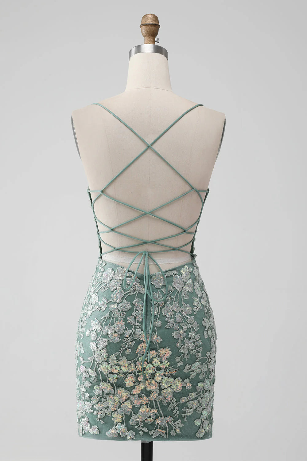 Back view of the grey green bodycon short homecoming dress, showcasing the lace-up detail.