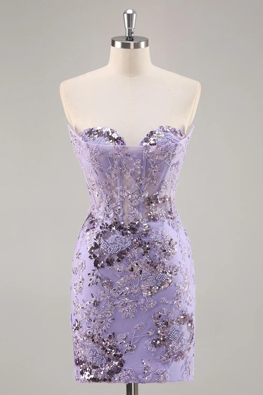 Purple strapless bodycon dress with sequins and corset detail.