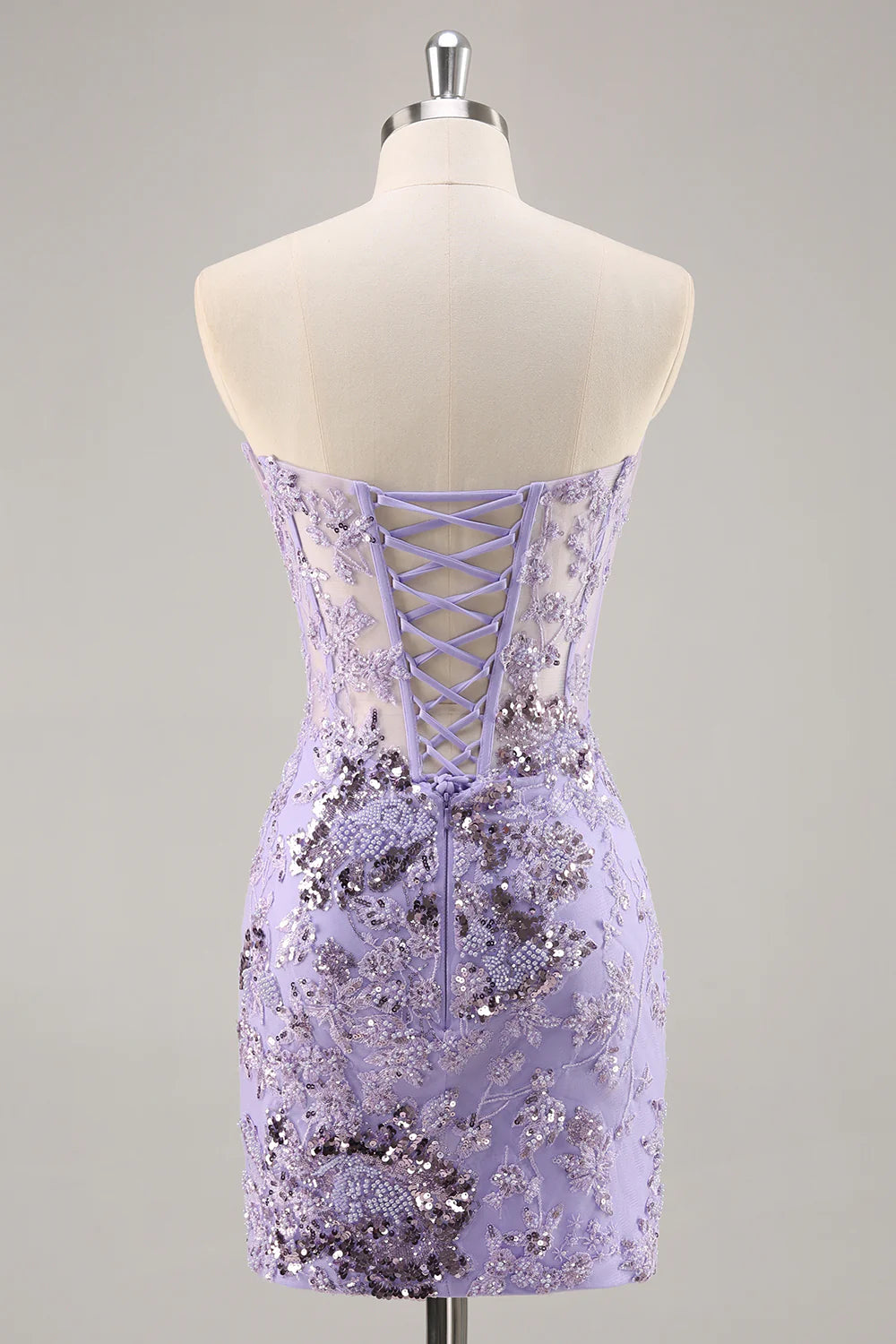 Back view of purple sequin strapless homecoming dress.