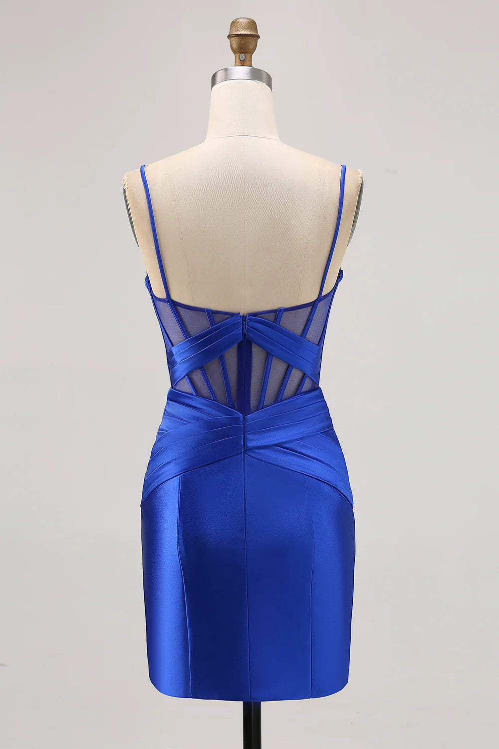 Back view of a royal blue bodycon dress with pleated details.