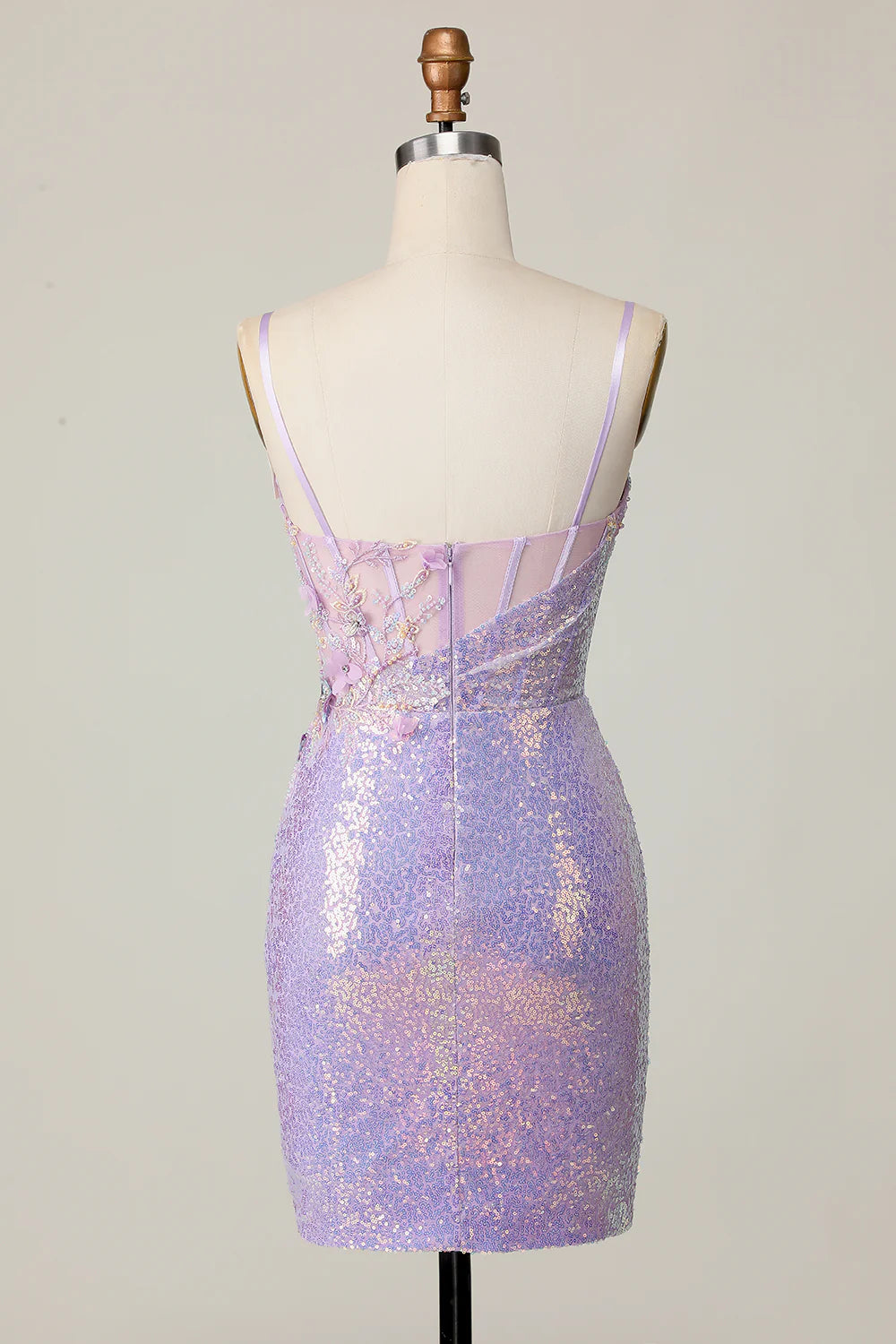 Back view of a lilac short bodycon dress featuring sequins and appliques.
