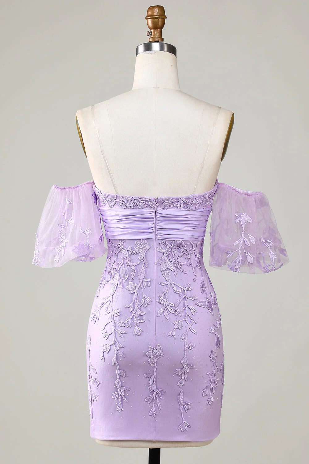 Purple bodycon dress with sweetheart neckline and bowknot, side view.