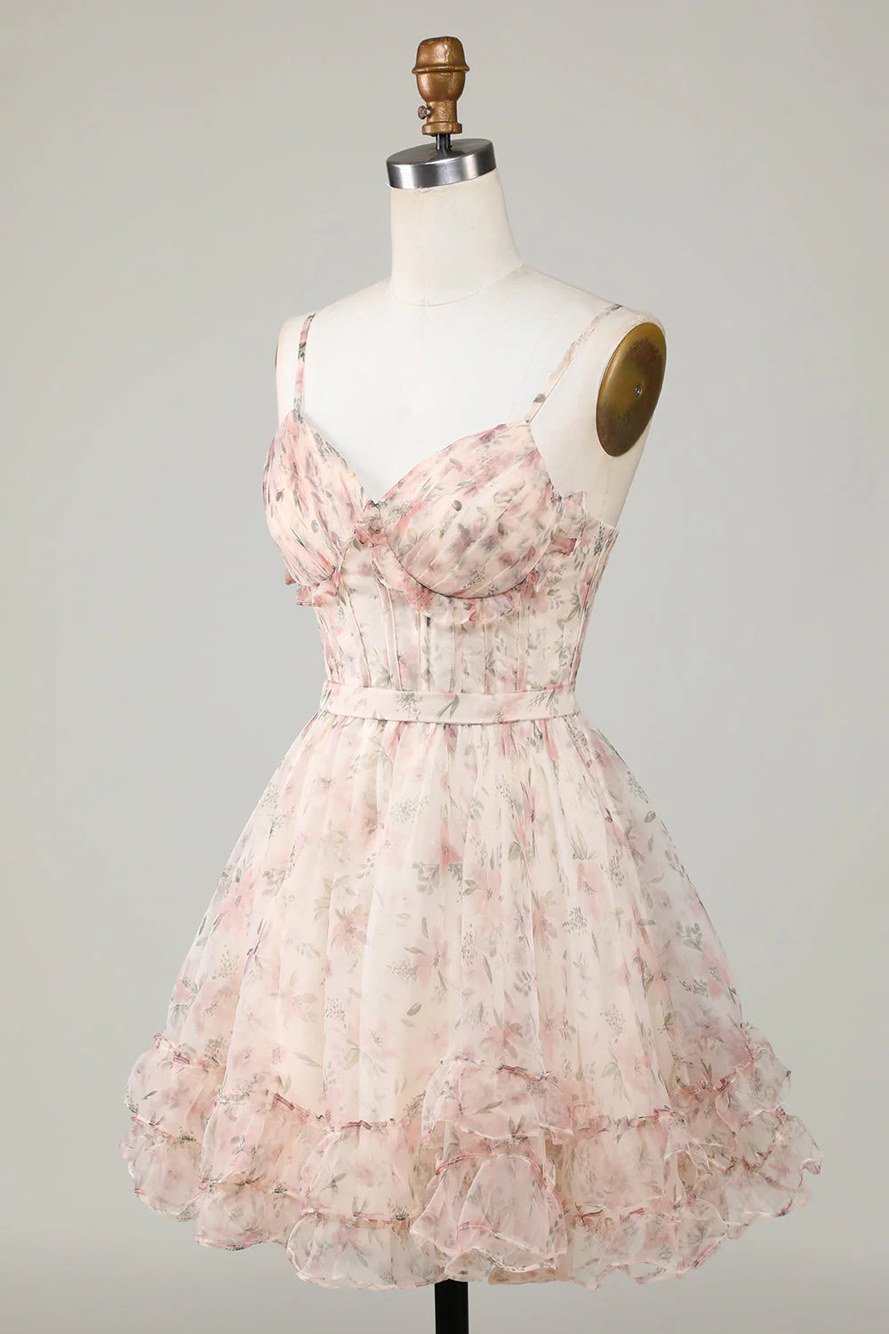 Side view of elegant champagne A-line short dress with floral embellishments.