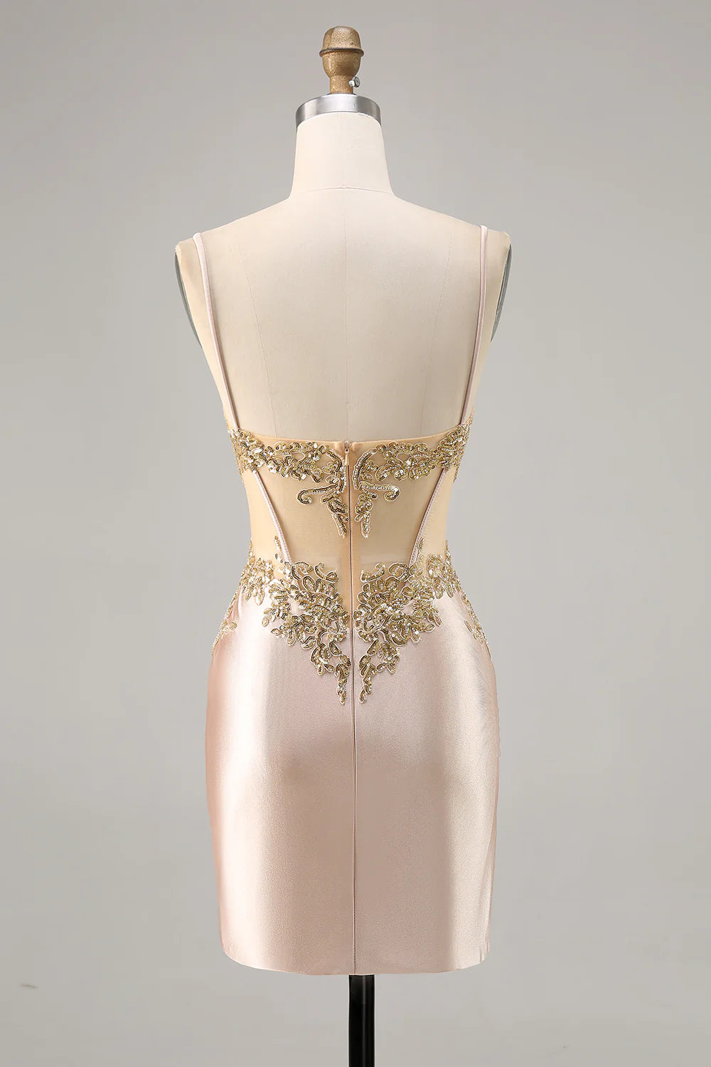Back view of champagne strapless homecoming dress with beading.