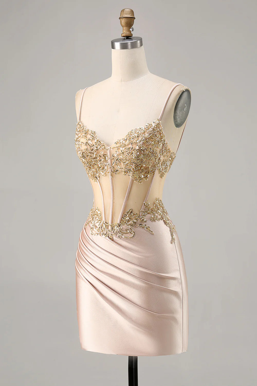 Side view of elegant champagne A-line party dress with sequin details.