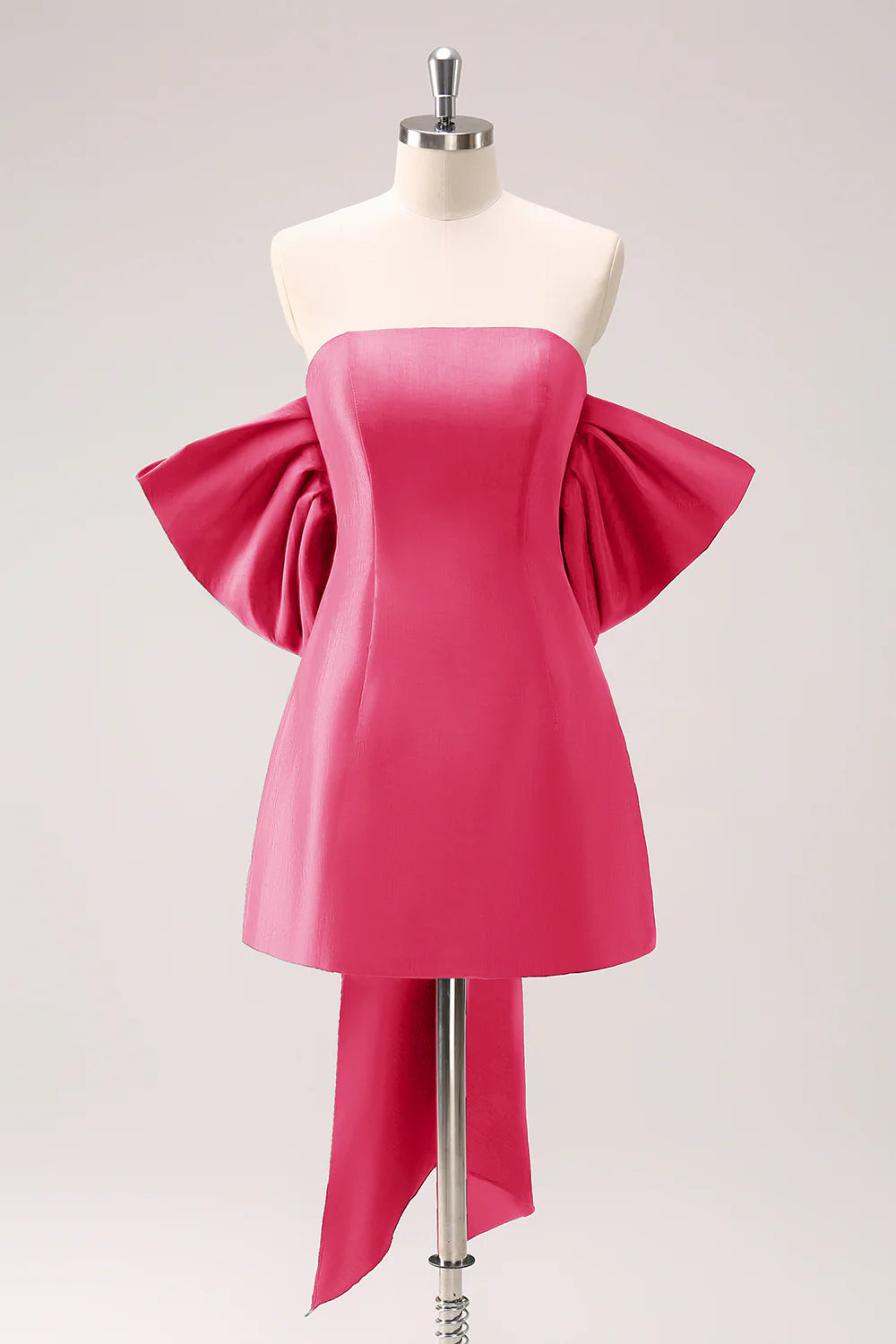 Fuschia A-line strapless short homecoming dress with a bow.