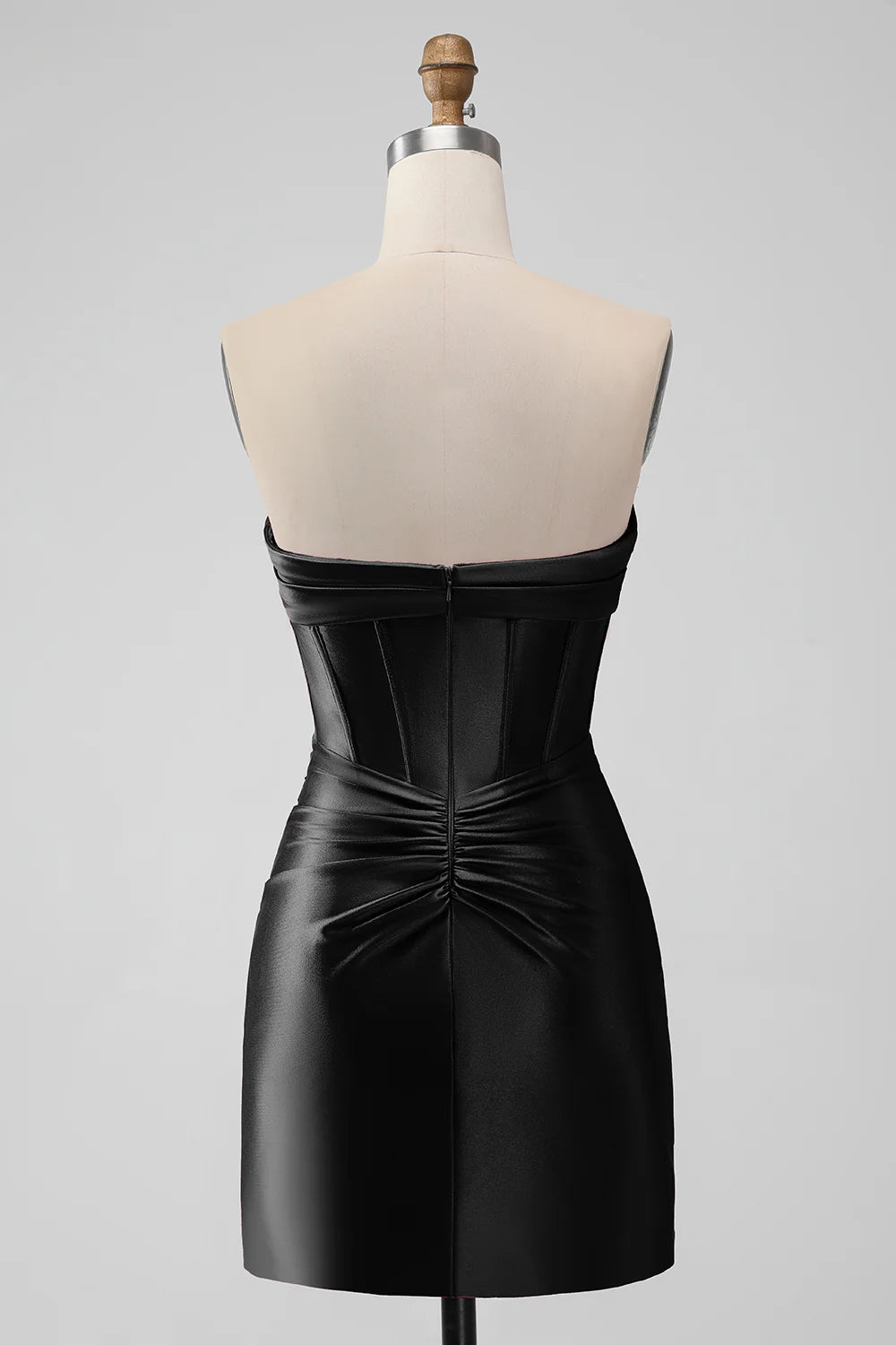 Back view of Black Bodycon Homecoming Dress with pleated skirt and fitted design.