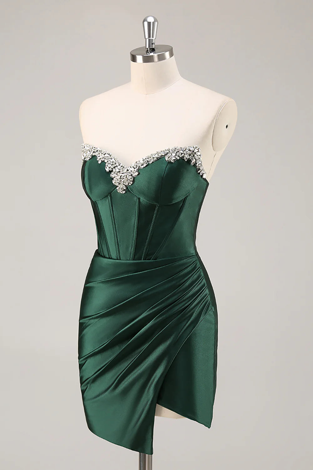 Back view of the dark green strapless bodycon satin dress, highlighting the corset-style bodice.