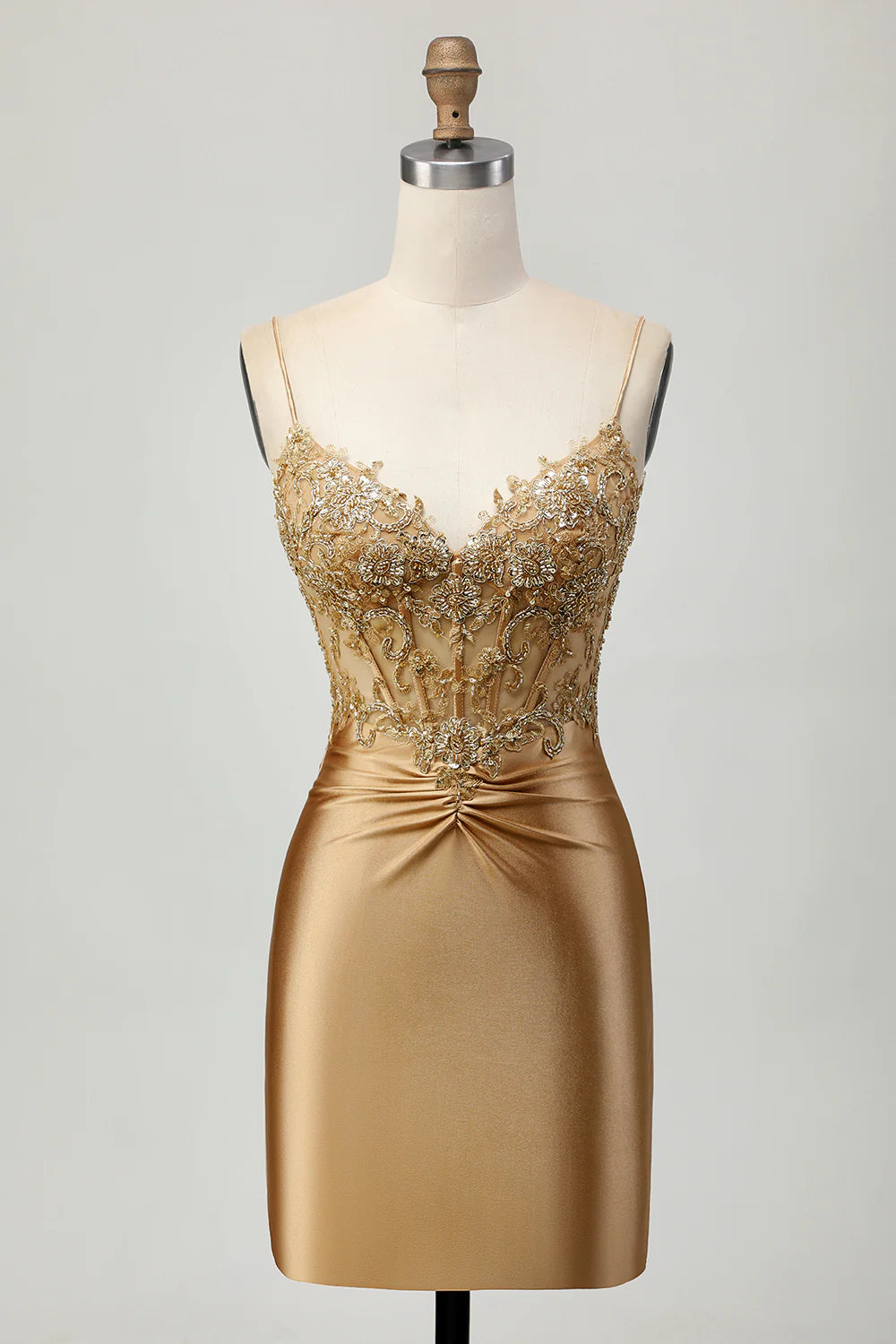 Golden satin short homecoming dress with appliques and lace-up back.