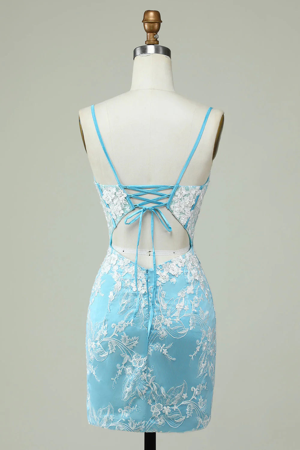 Back view of the light blue sheath dress, showcasing its elegant silhouette and design.