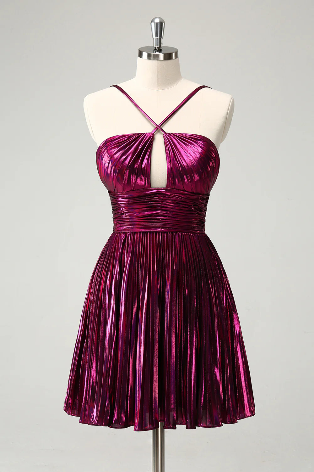 Purple metallic A-line homecoming dress with pleated skirt and hollow-out detail.