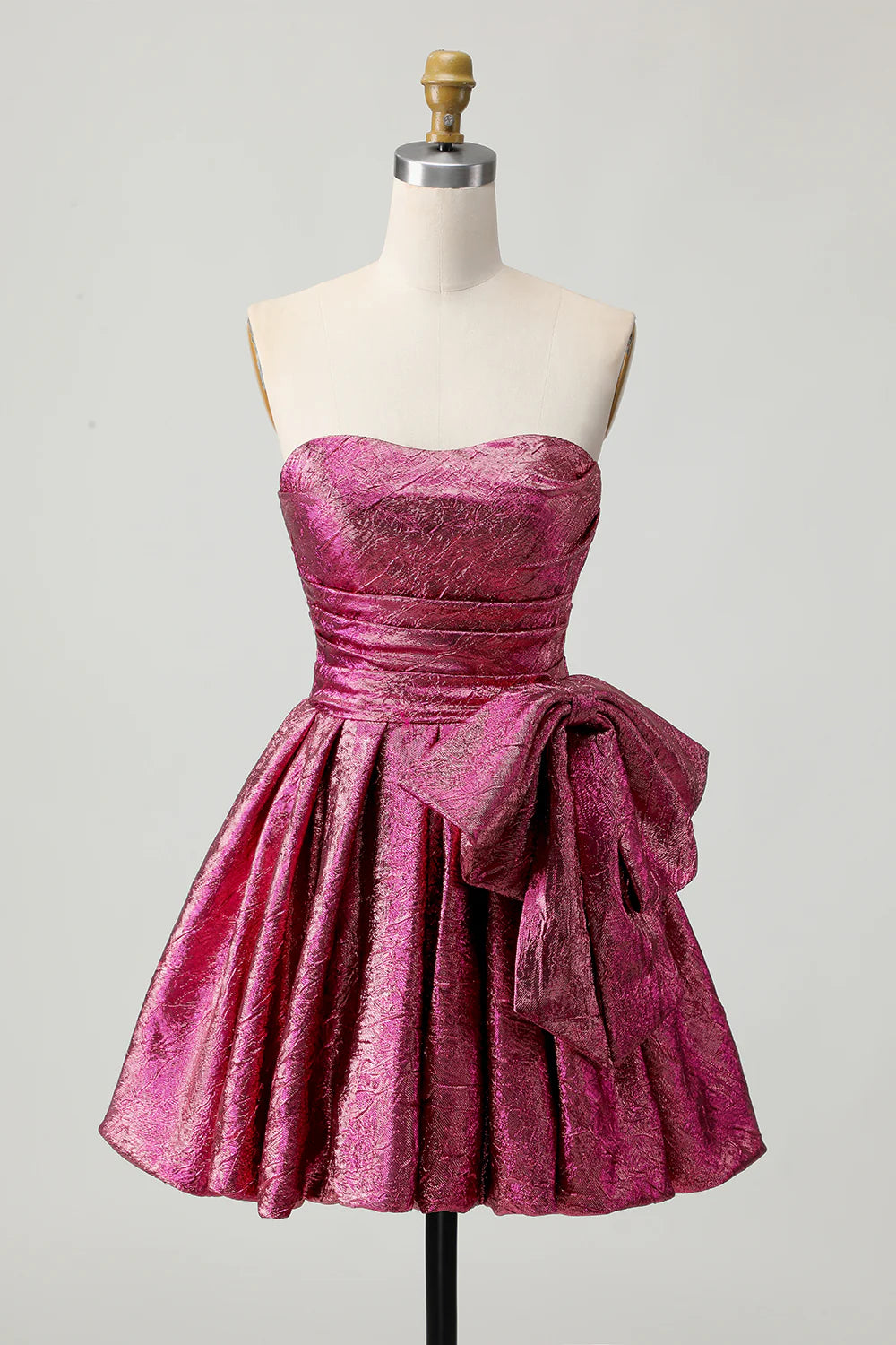 Full view of the metallic dark purple ruched strapless ankle-length homecoming dress with a bow.
