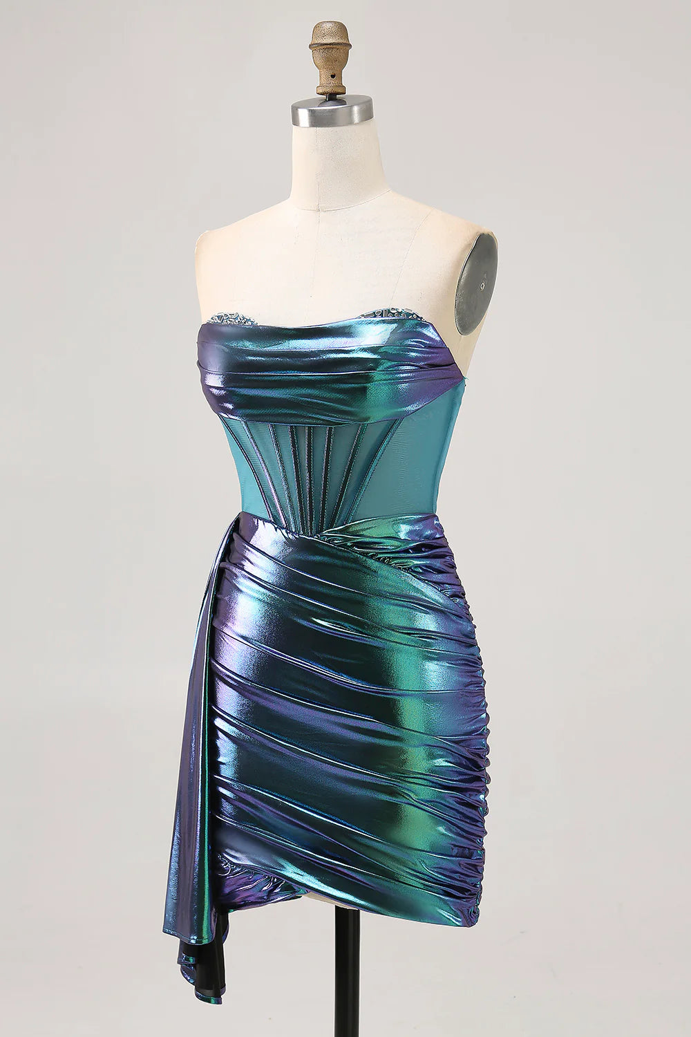 Close-up of the metallic green strapless corset ruched short homecoming dress, showing fabric and ruched details.