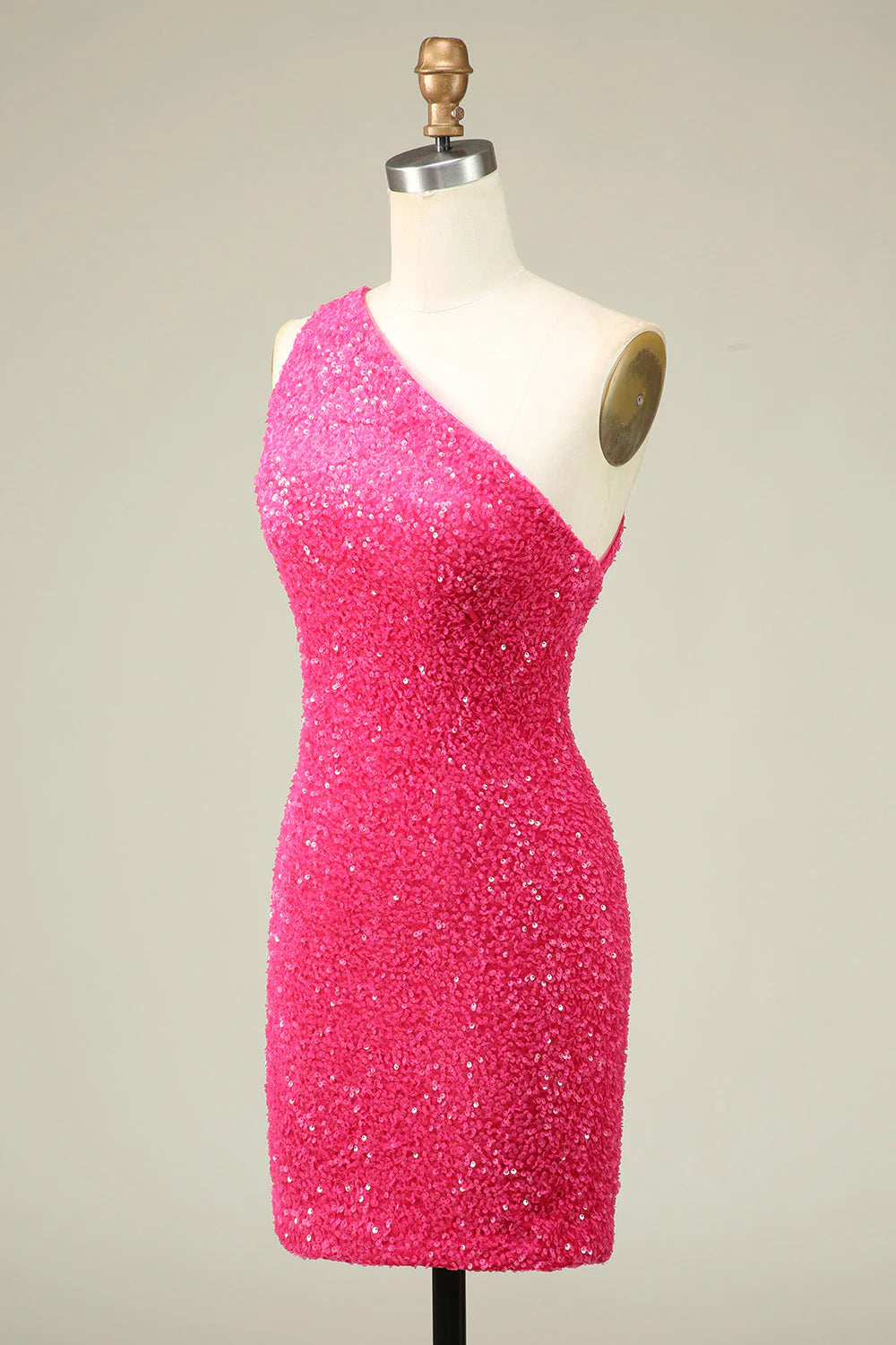 Side view of the elegant fuchsia sequin formal gown.
