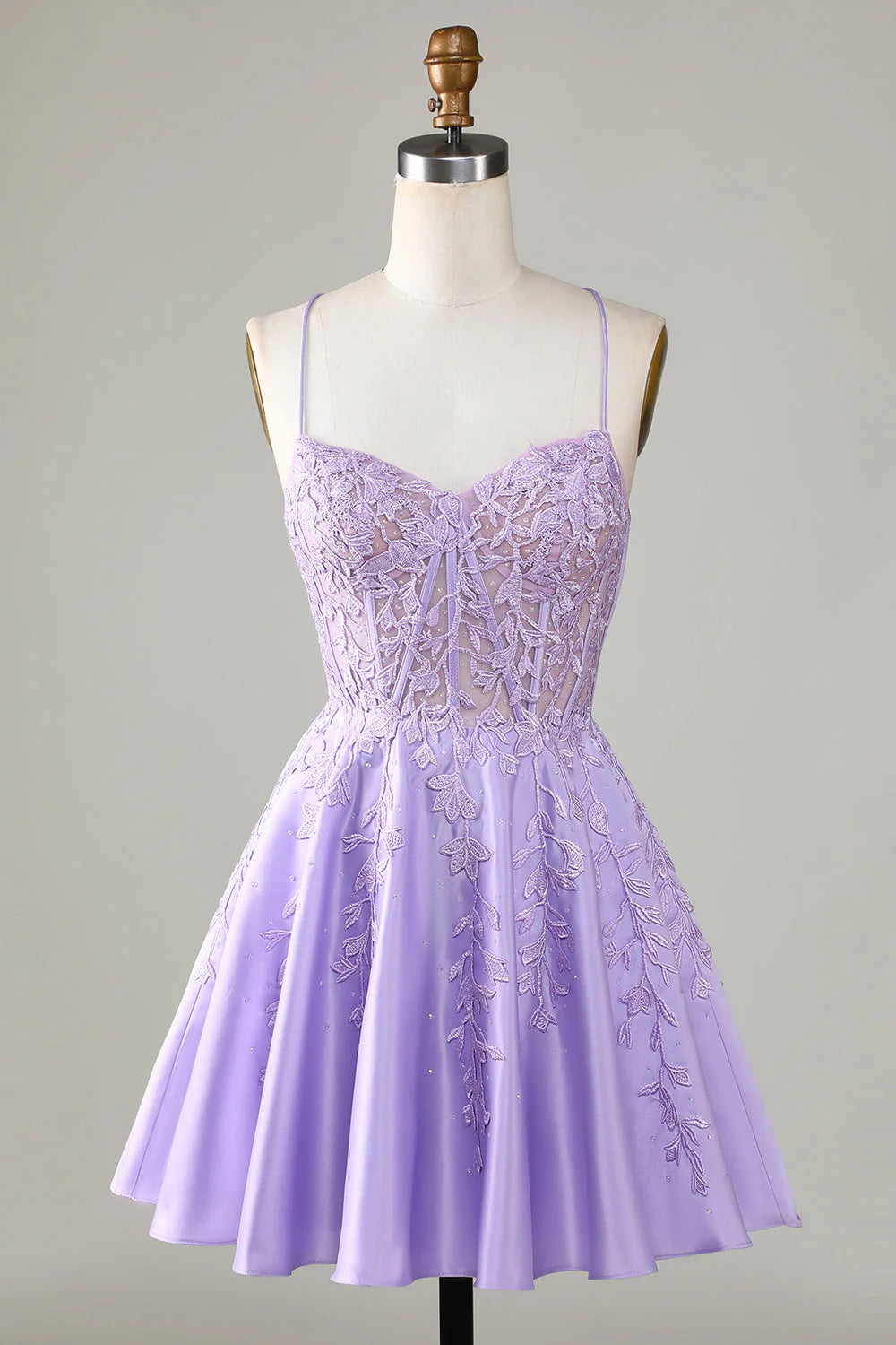 Front view of a purple corset A-line short homecoming dress with lace.