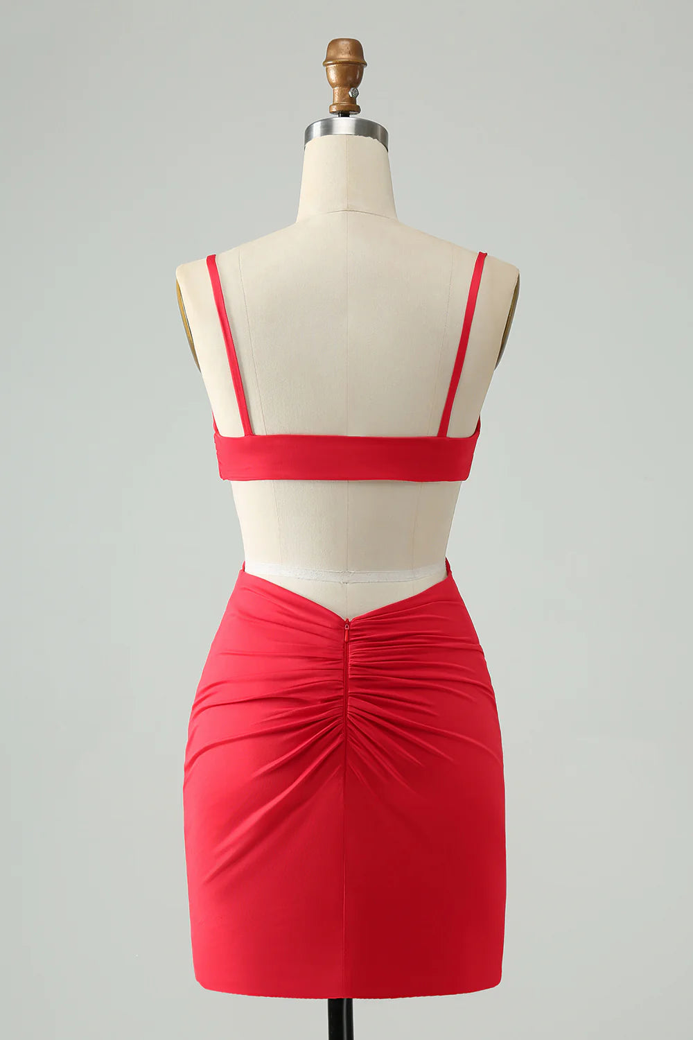 Back view of red bodycon dress showing floor-length skirt.