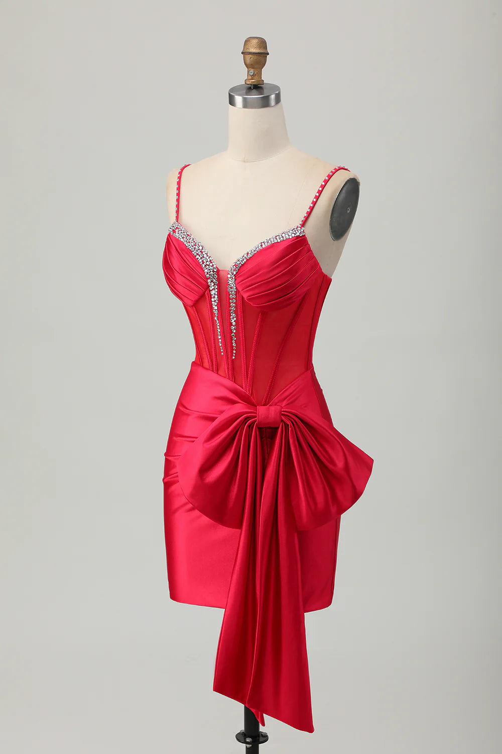 Side profile of a red strapless bodycon dress, highlighting the beaded corset.