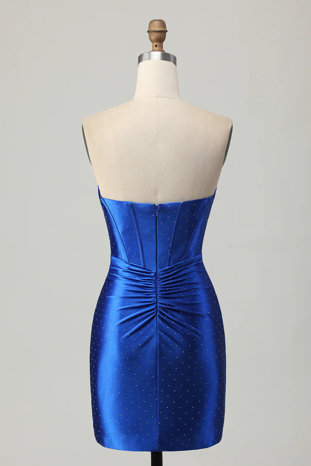 Side view of a royal blue short homecoming dress.