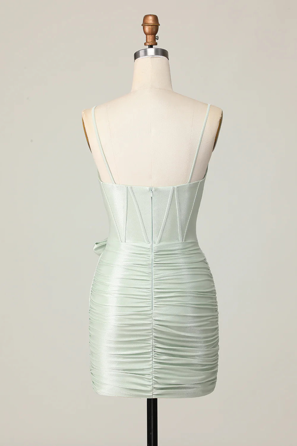 Back view of sage strapless sweetheart homecoming dress with ruched corset.