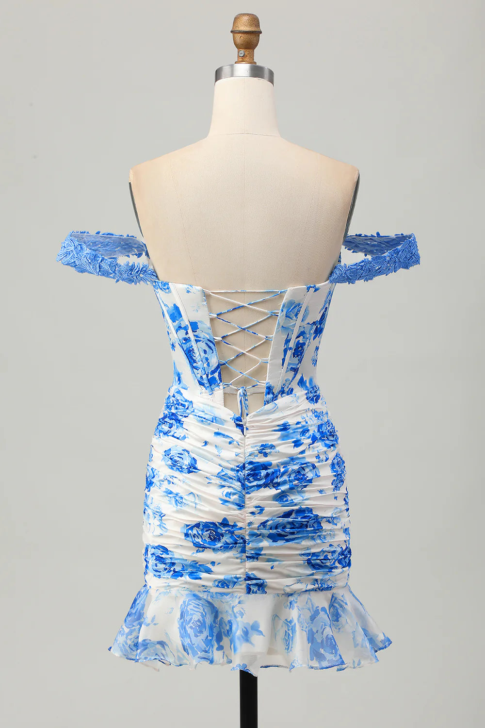 Back view of the white and blue floral bodycon off-shoulder corset short homecoming dress.