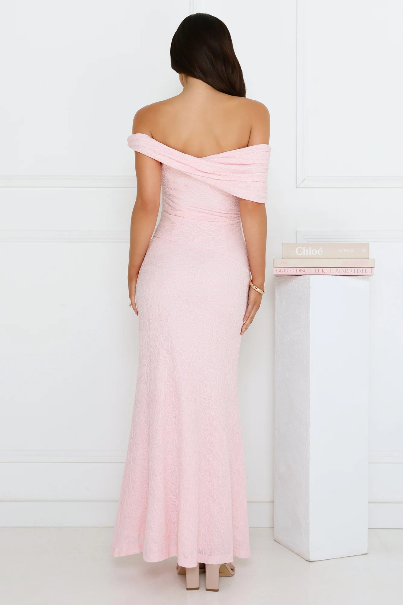Elegant Blush Pink Off-the-Shoulder Maxi Dress with Draped Neckline, Textured Lace Fabric, Ruched Waist Detail and Flowy Mermaid Skirt
