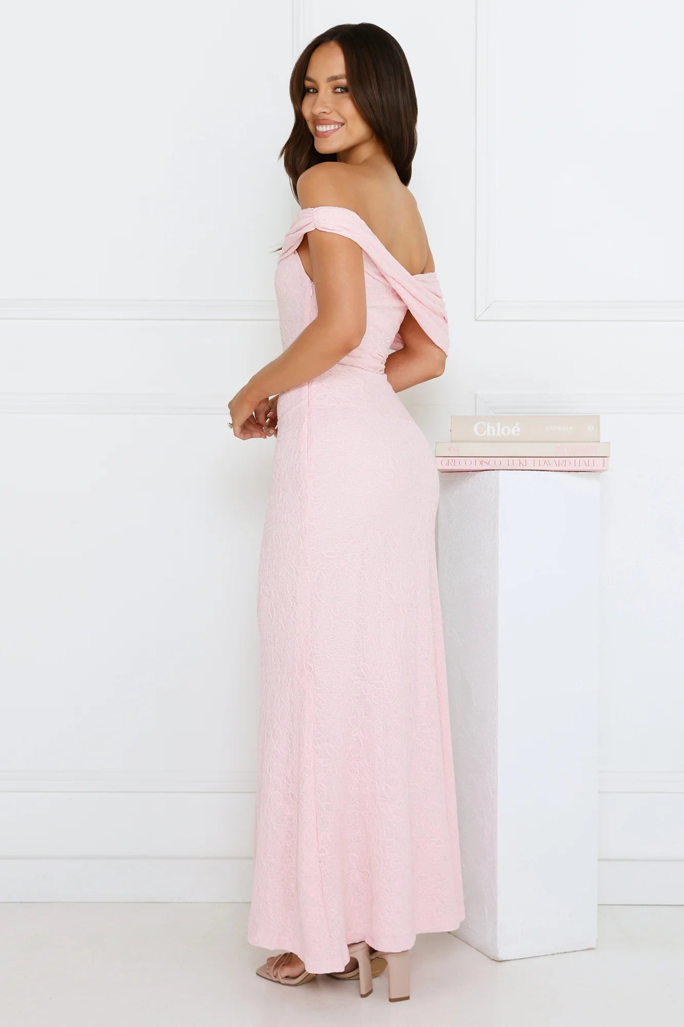 Elegant Blush Pink Off-the-Shoulder Maxi Dress with Draped Neckline, Textured Lace Fabric, Ruched Waist Detail and Flowy Mermaid Skirt
