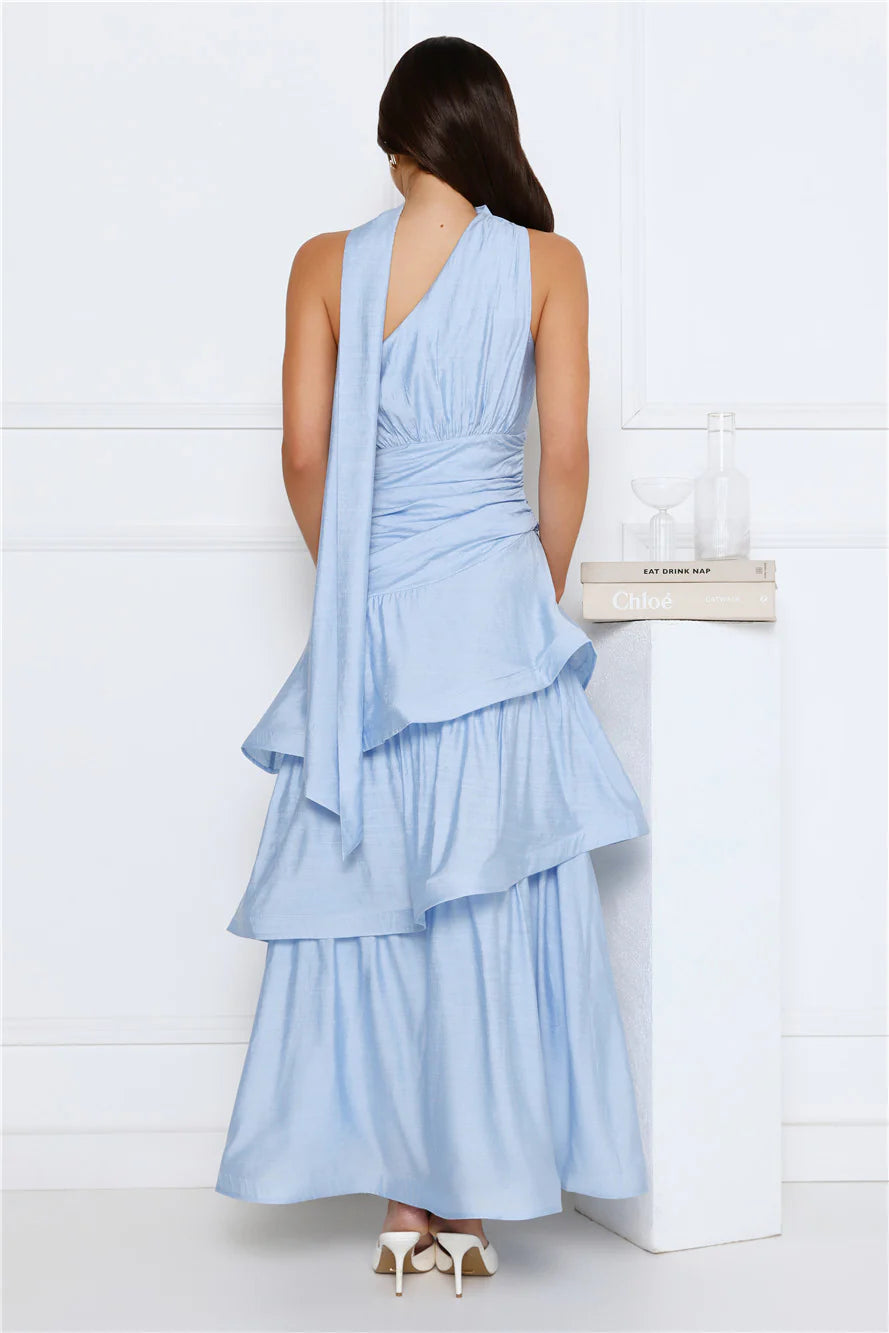Elegant Sky Blue Halter Neck Maxi Dress with Asymmetric Neck Wrap, Ruched Waist Detail, Tiered Ruffle Skirt and Open Back Sash