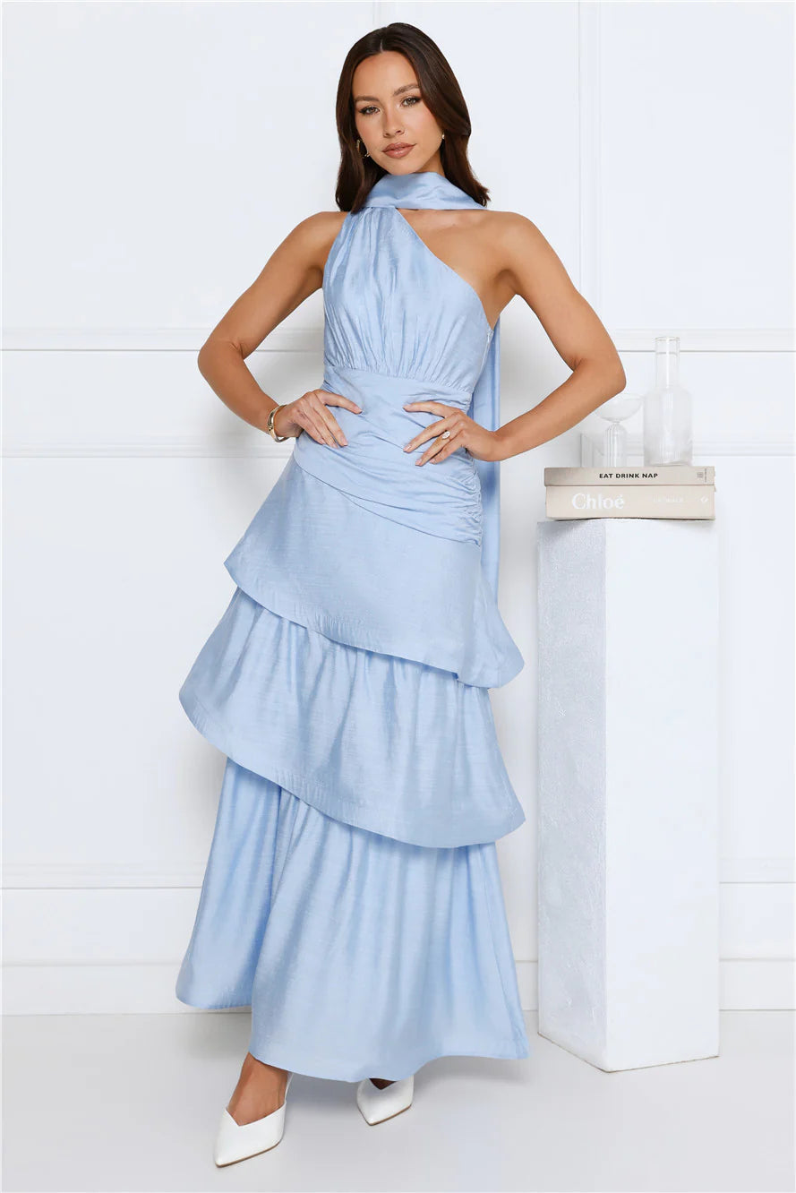 Elegant Sky Blue Halter Neck Maxi Dress with Asymmetric Neck Wrap, Ruched Waist Detail, Tiered Ruffle Skirt and Open Back Sash