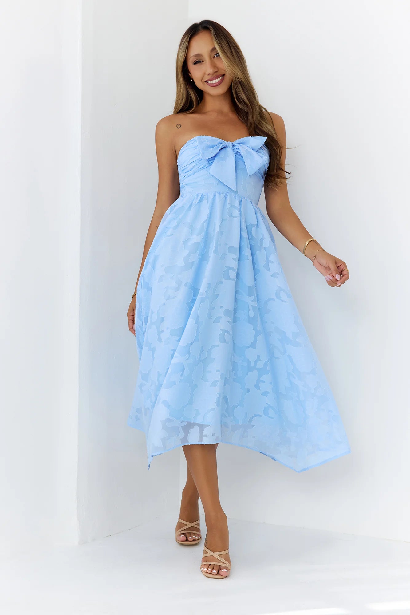 Elegant Sky Blue Strapless Midi Dress with Bow Accent, Floral Jacquard Texture, Smocked Back Panel and Asymmetrical Handkerchief Hem