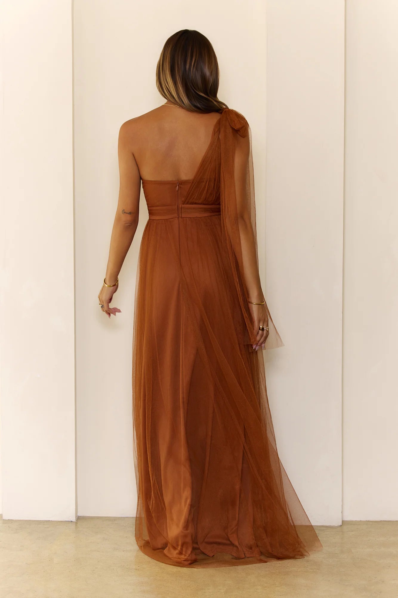 Elegant Terracotta Tulle One-Shoulder Maxi Dress with Sweetheart Corset Bodice, Bow Shoulder Accent, Wide Waist Sash and High Thigh Slit