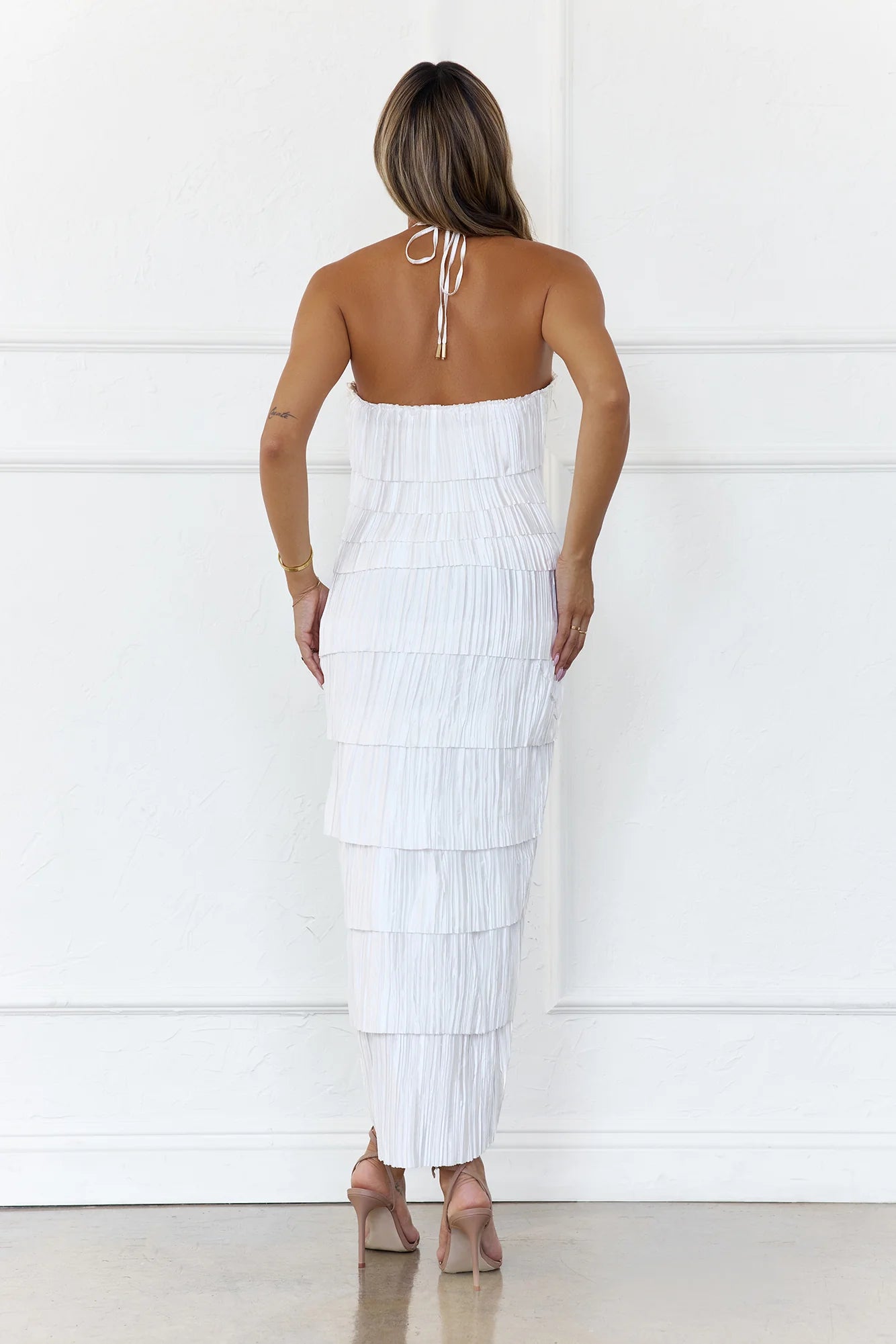 Elegant White Halter Neck Midi Dress with Tiered Pleated Texture, Asymmetric Hem and Open Back Tie Closure