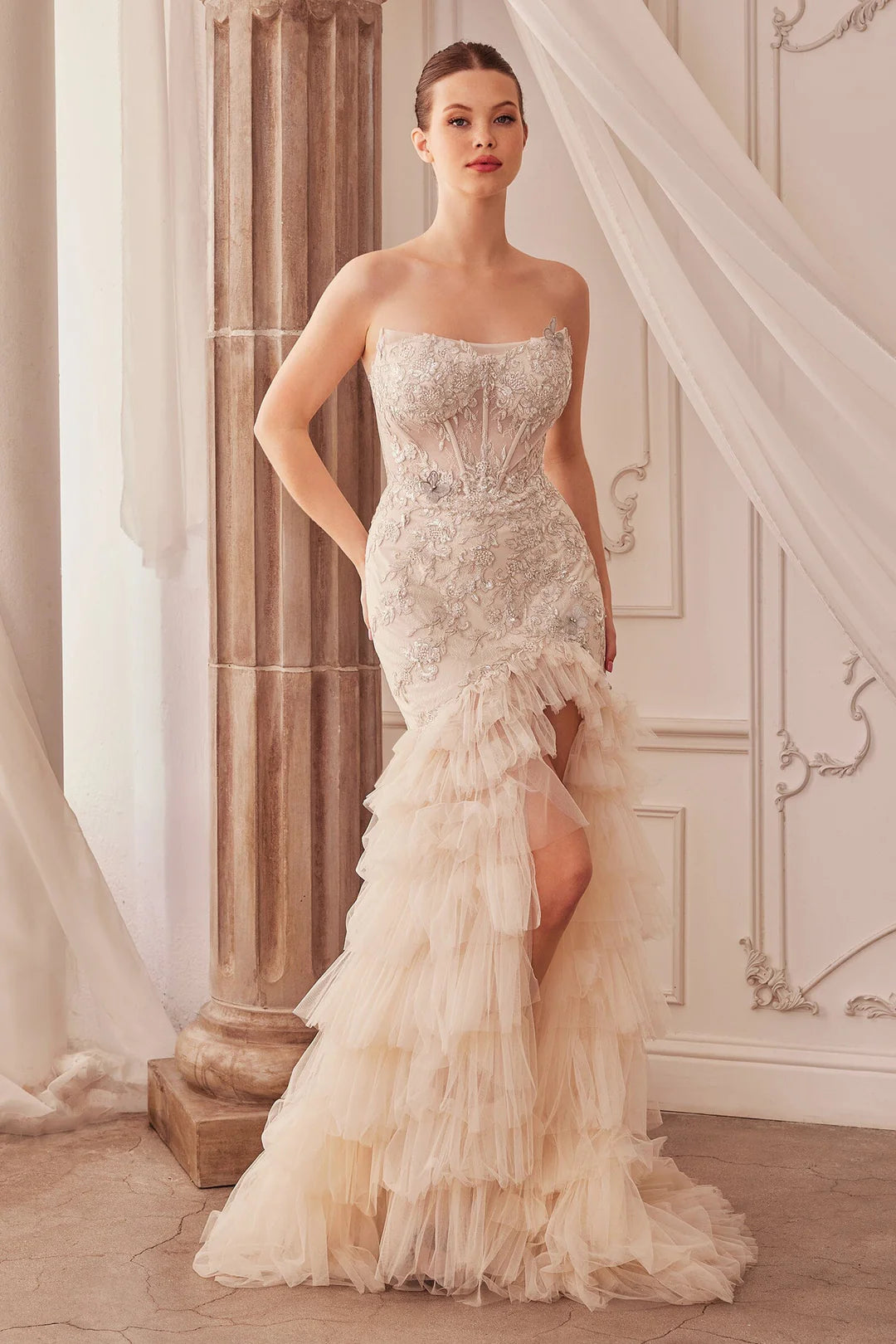 Flat neck sleeveless strapless mermaid dress with multiple layers of trailing