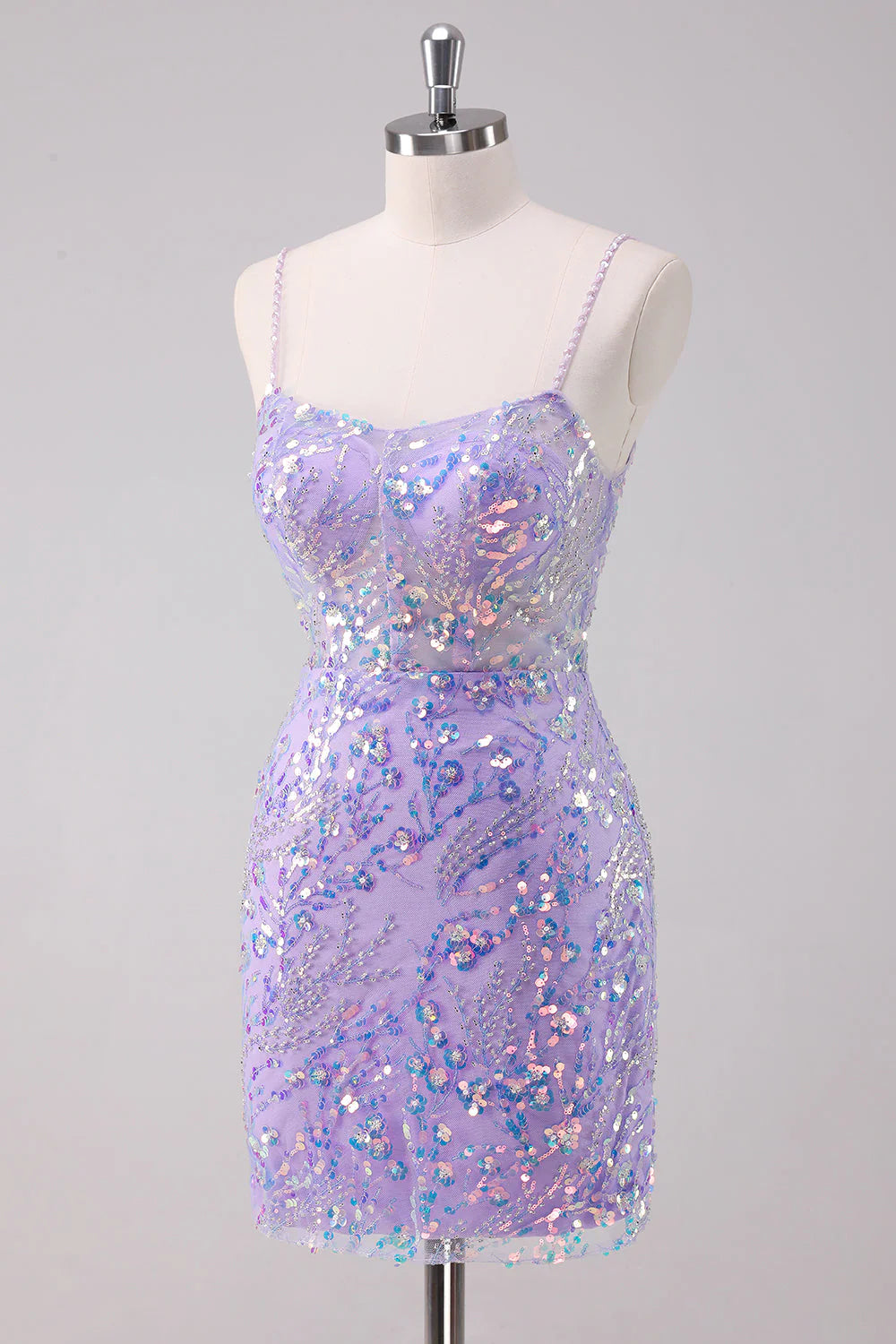 Close-up of the shimmering sequins on the purple bodycon homecoming dress.
