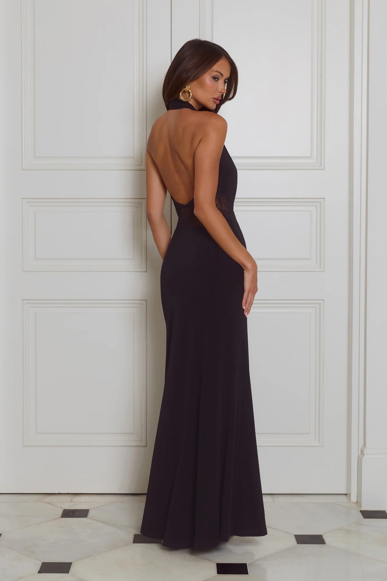 Glamorous Black Halter Neck Maxi Dress with Deep Plunge V-Neck, Sheer Lace Side Cutouts, Open Back Design and Floor-Length Flowing Skirt