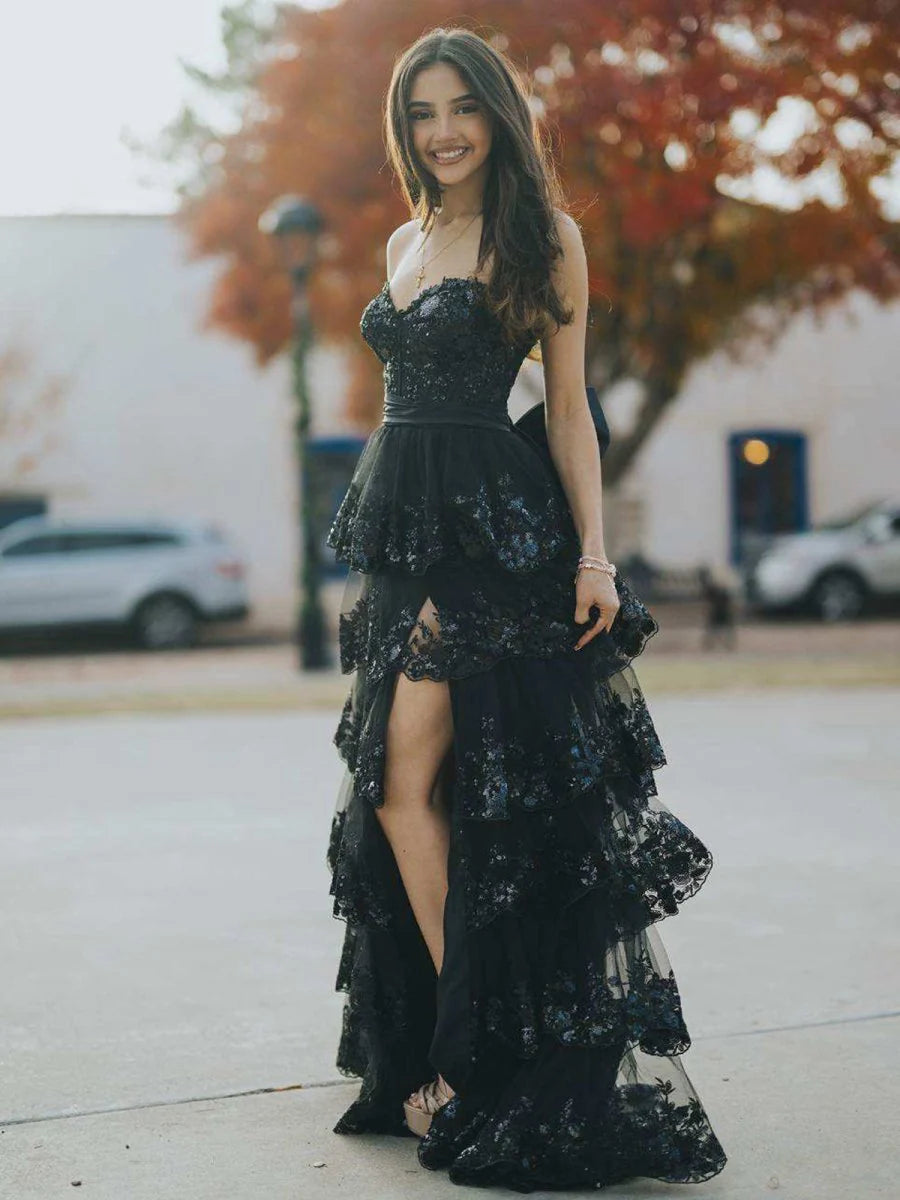 Glamorous Black Strapless Evening Gown with Sequin Embellished Bodice, Tiered Ruffle Tulle Skirt, Oversized Back Bow and High Thigh Slit