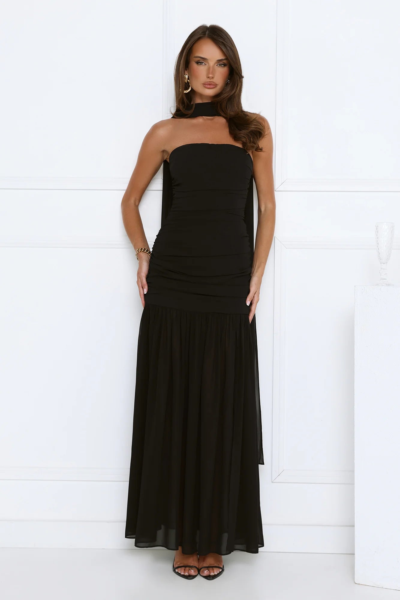 Glamorous Black Strapless Maxi Dress with High Neck Draped Sash Detail, Ruched Waist Accent, Open Back Design and Flowy Chiffon Mermaid Skirt
