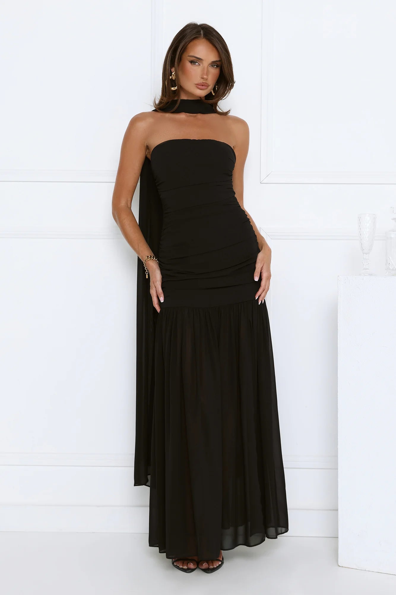 Glamorous Black Strapless Maxi Dress with High Neck Draped Sash Detail, Ruched Waist Accent, Open Back Design and Flowy Chiffon Mermaid Skirt