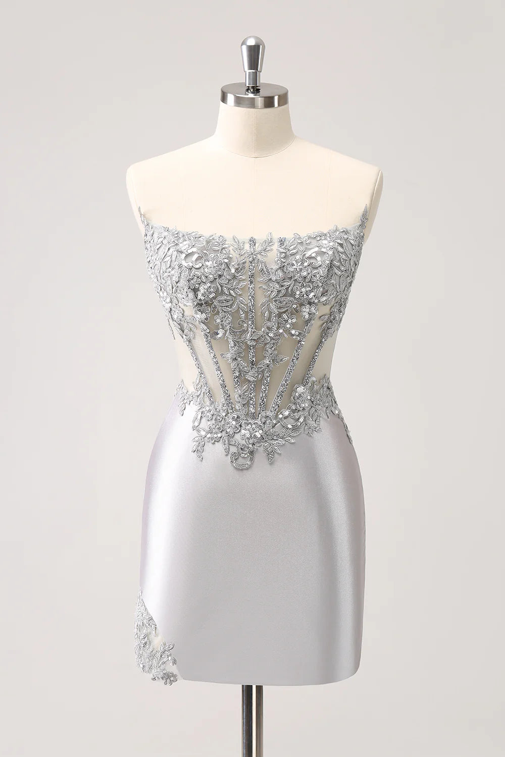 Glittering silver strapless A-line homecoming dress with corset bodice.