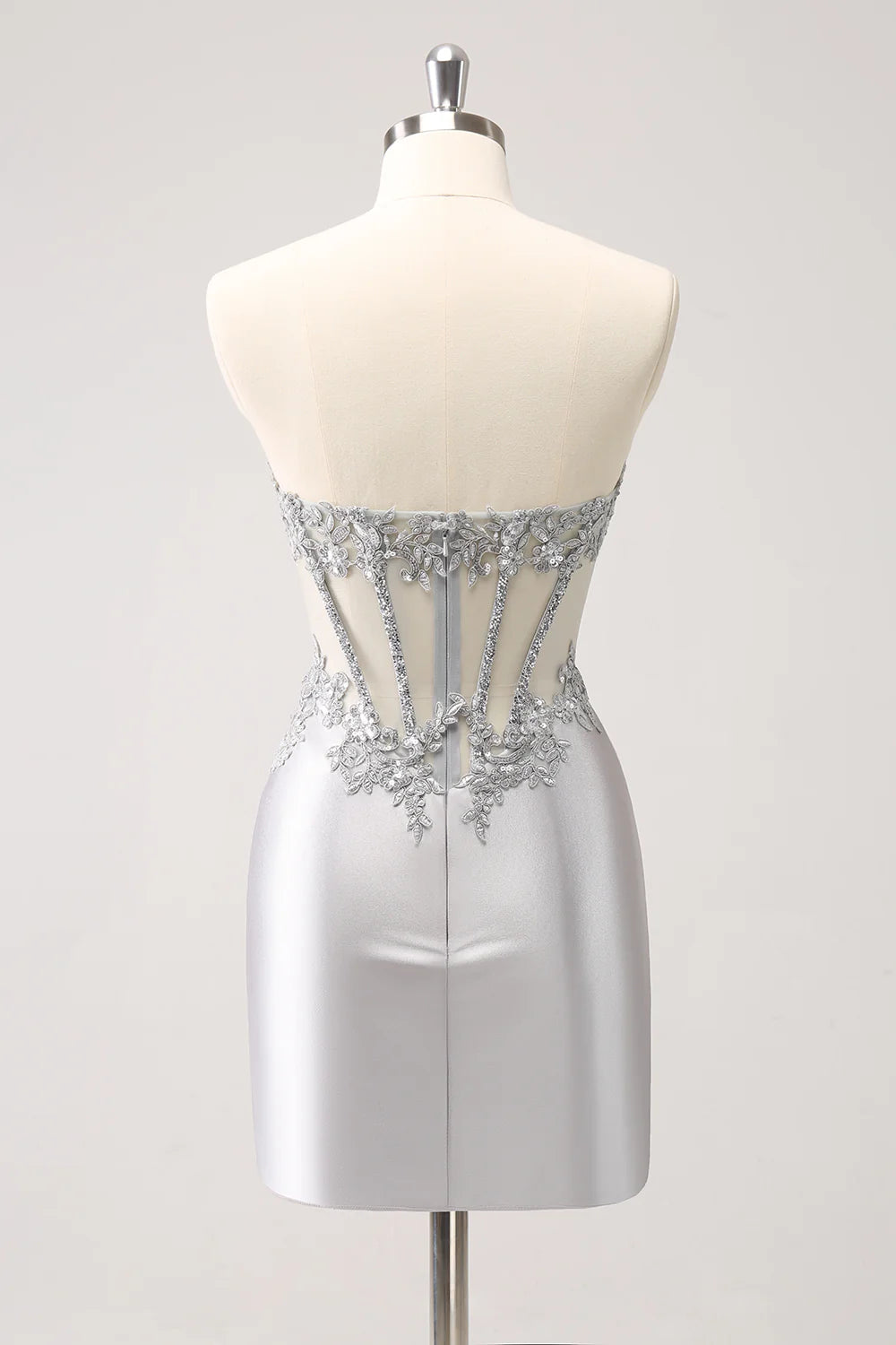 Back view of the silver glitter strapless dress, showing the elegant skirt.