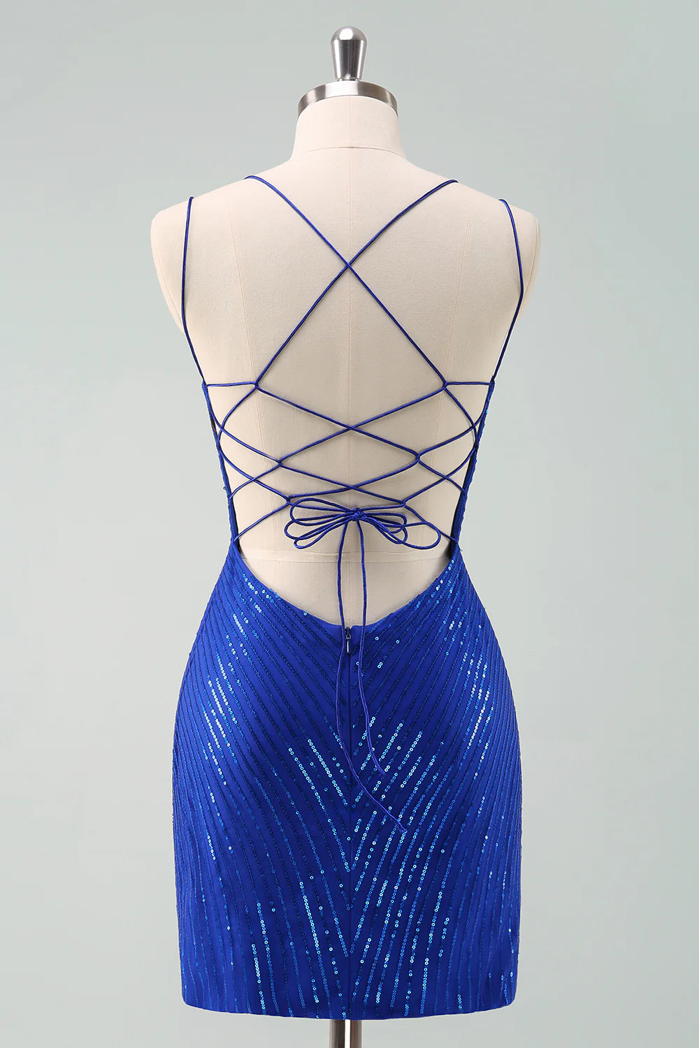 Close-up of the royal blue glitter dress bodice with sequin butterfly embellishments.