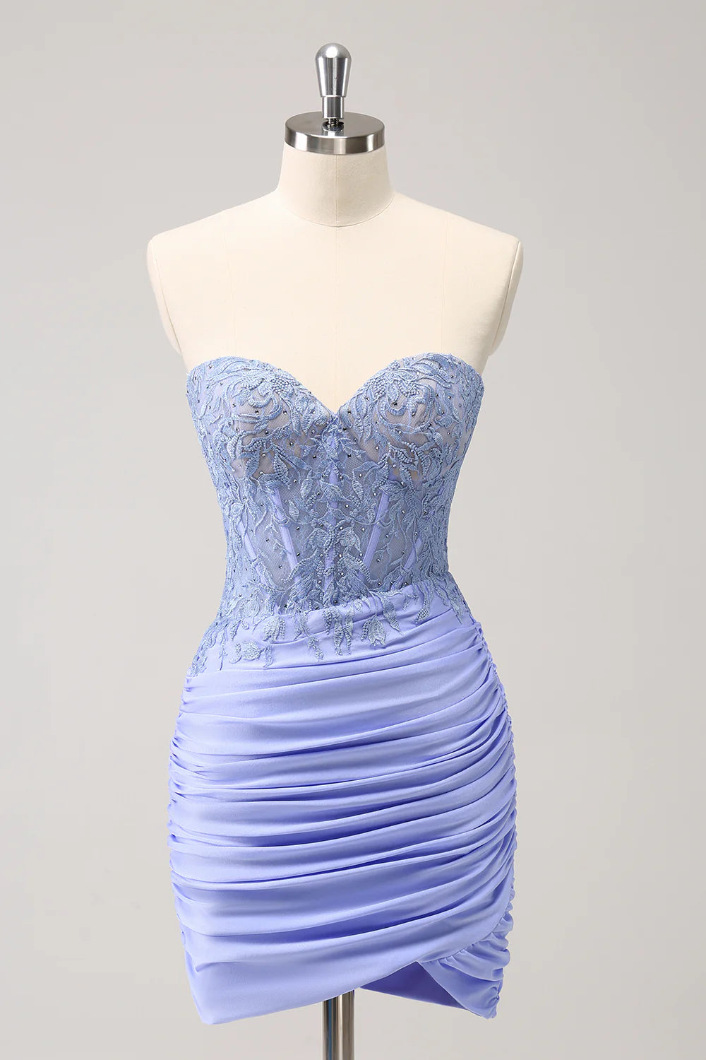Front view of a glittering lilac sweetheart corset short homecoming dress with beading.