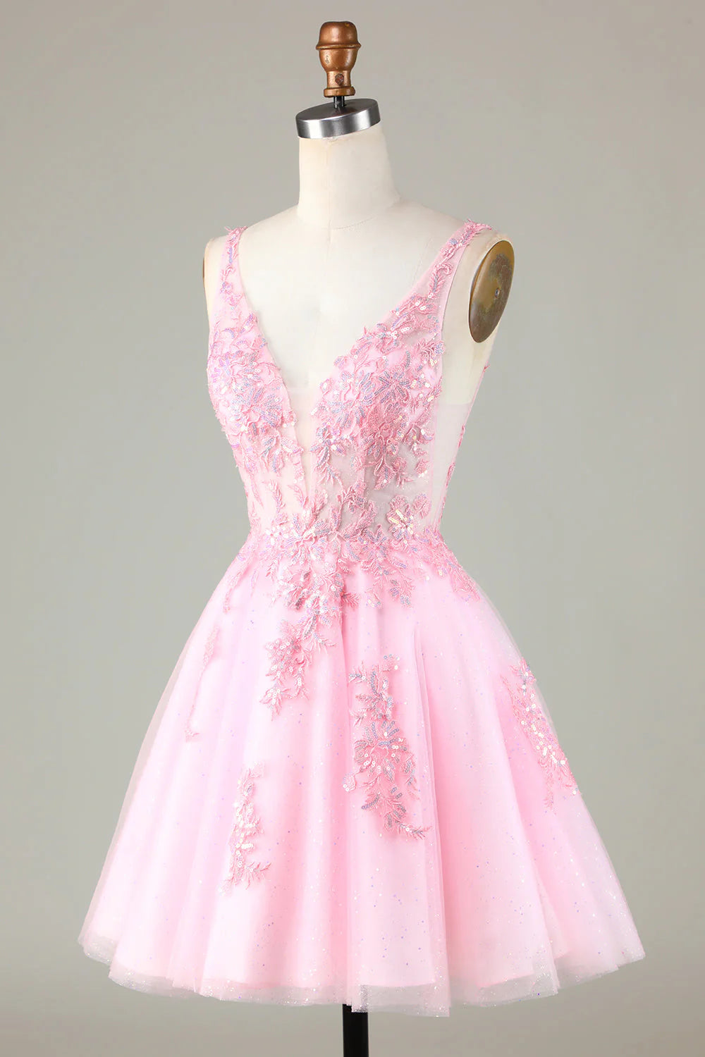 Side view of the pink glitter sequin short homecoming dress.