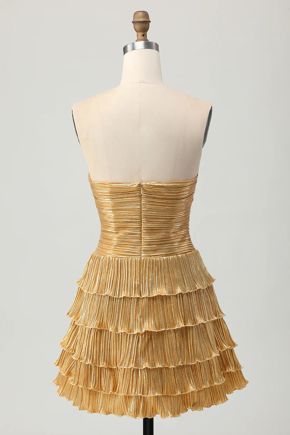 Back view of the golden tiered A-line strapless homecoming dress.