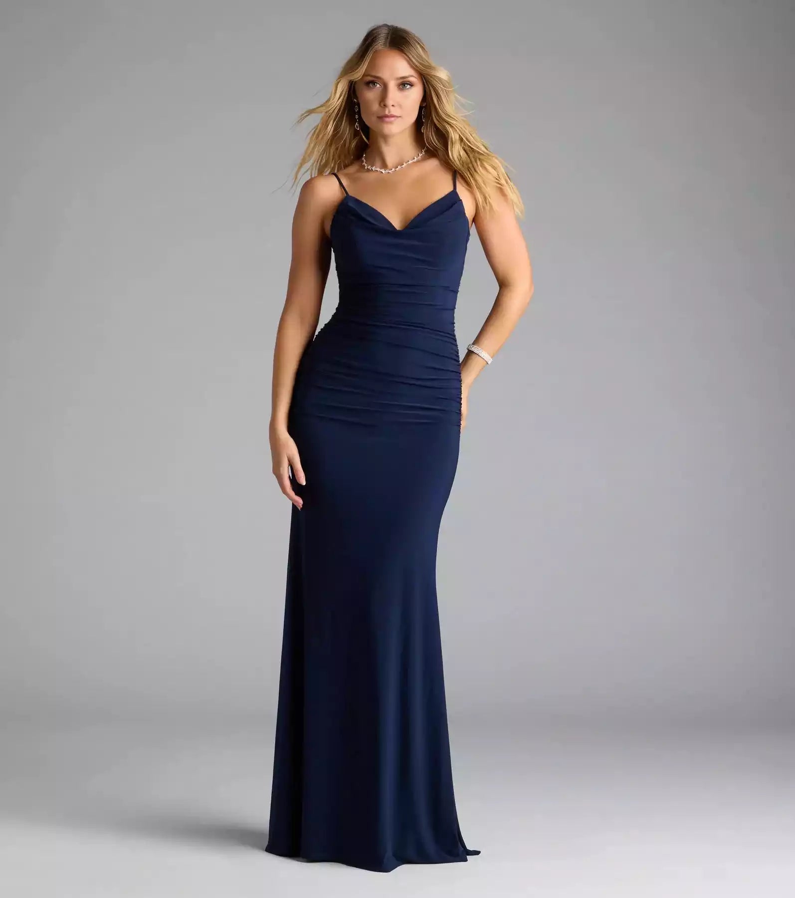 Gorgeous smooth knit hanging collar with adjustable thin shoulder strap, backless hem, zipper, pleated mermaid and floor Prom Dresses