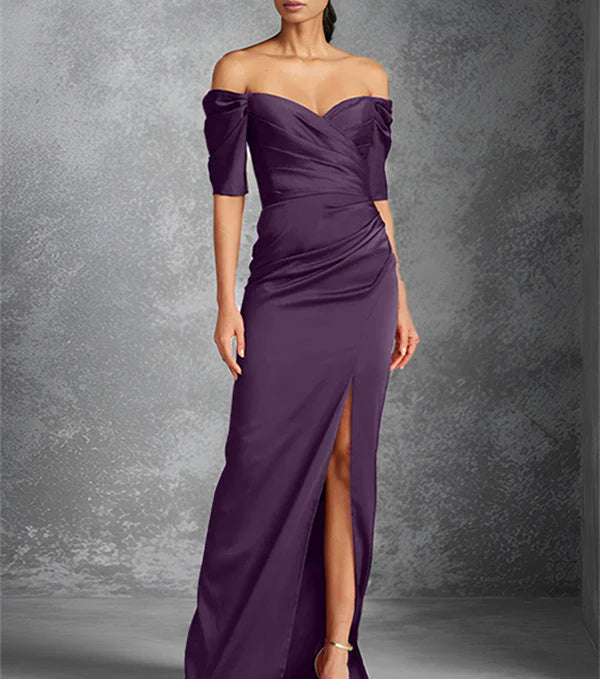 Tight off shoulder short sleeved floor standing bridal dress with front slit