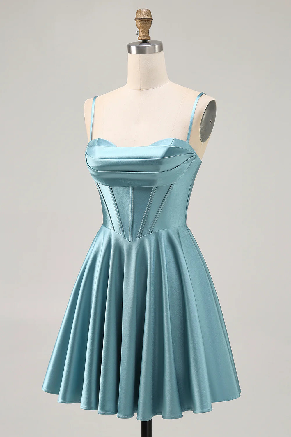 Side view of a model wearing a grey green A-line short satin homecoming dress.