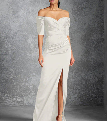 Tight off shoulder short sleeved floor standing bridal dress with front slit