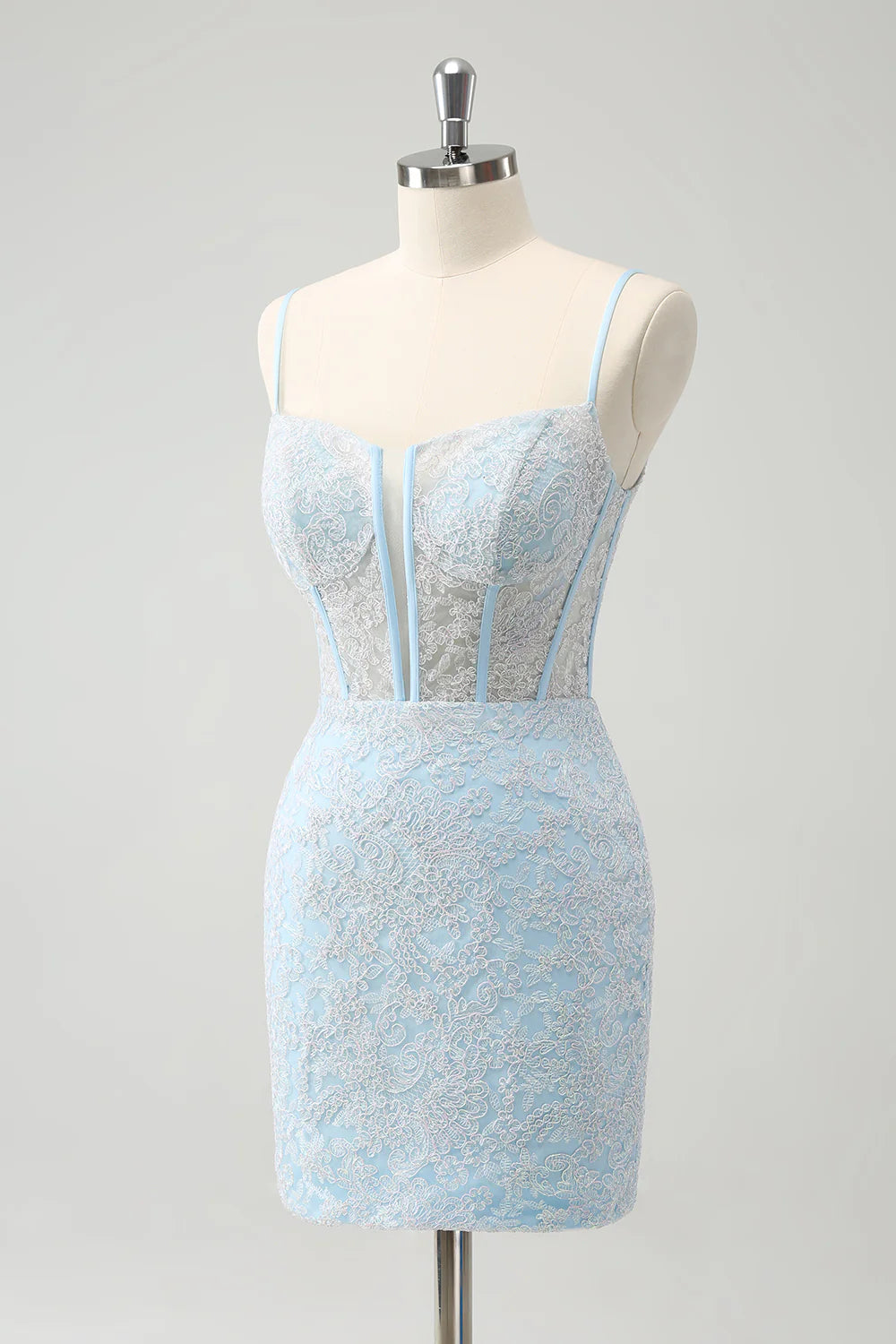 Back view of the light blue corset spaghetti strap short homecoming dress with lace-up detail.